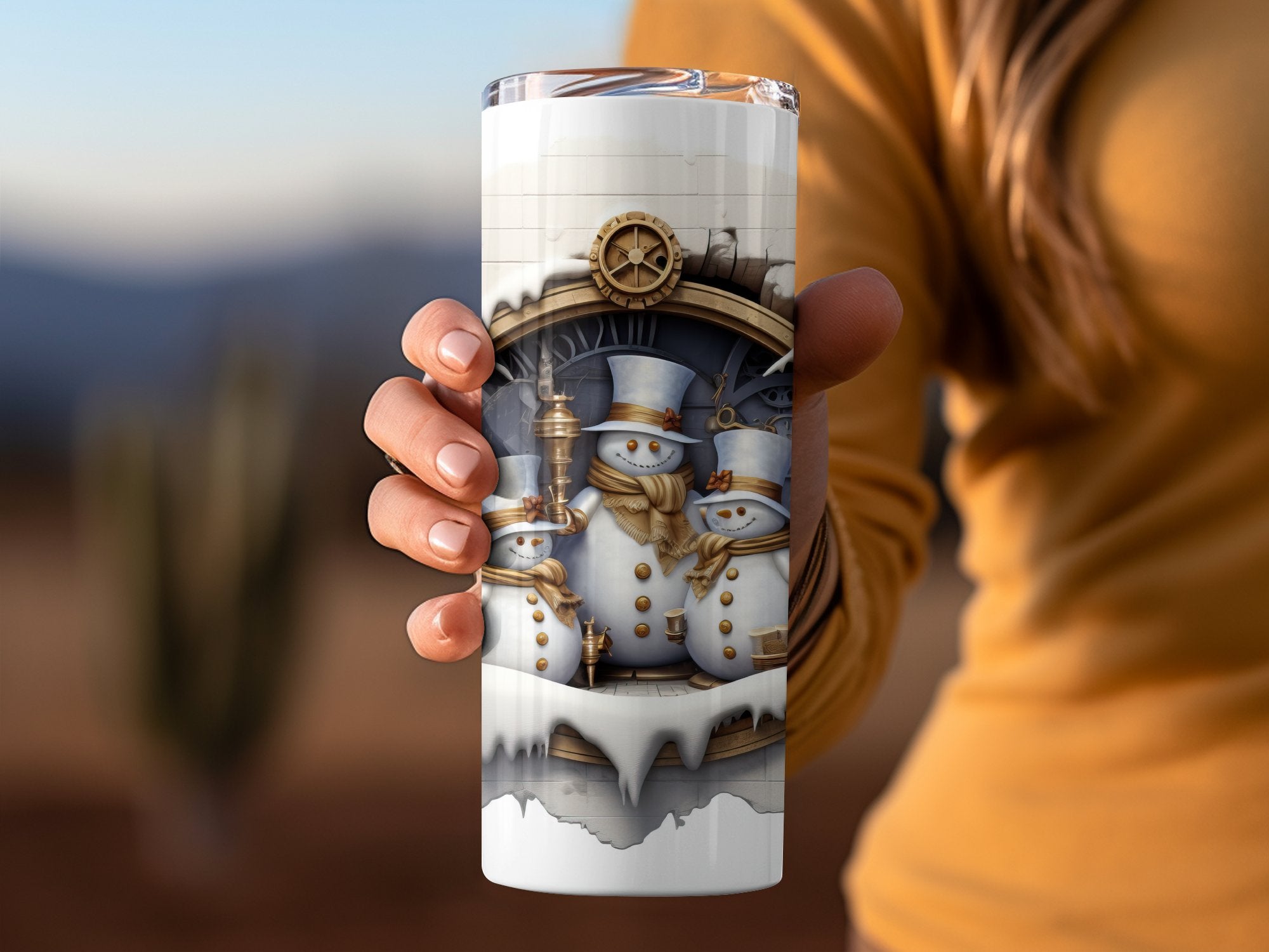 Gold Themed Three Snowmen Peeking Through Cracked Wall 20 oz Skinny Tumbler Wrap - Gabe Atkins Designs