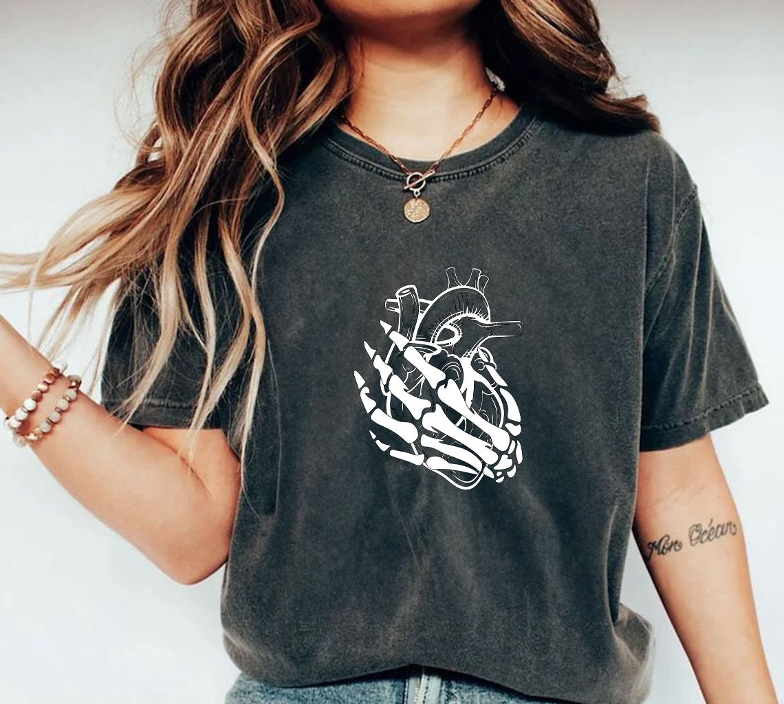 Skeleton Hand Holding an Anatomical Heart T-Shirt | Unconventional Love Showing My Heart is in Your Hands T-Shirt