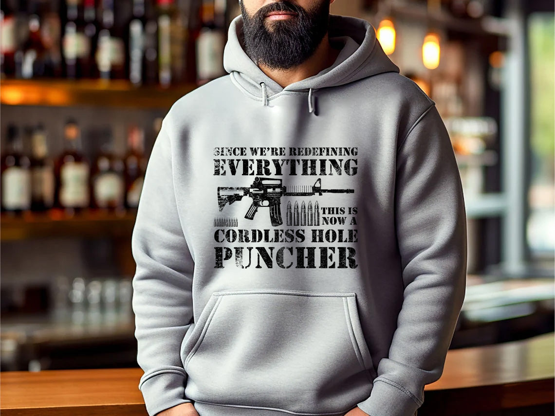 Patriotic Pro-Gun Hoodie Since We Are Redefining Everything Cordless Hole Puncher Design, USA Spirit, Ideal Gift for Pro-Gun Dads Hoodie - Gabe Atkins Designs